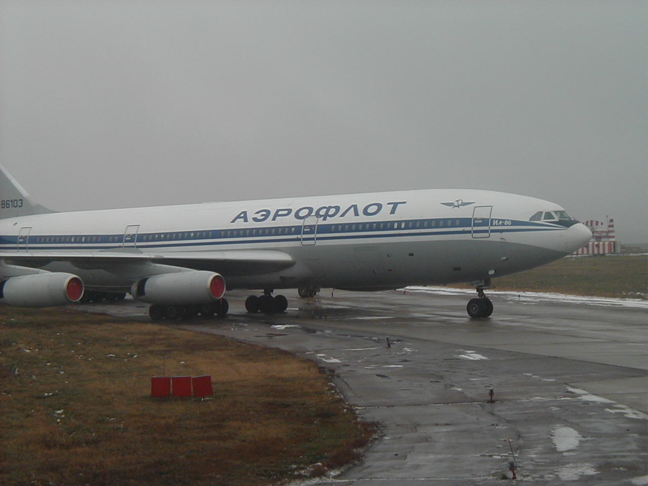Aboard Aeroflot Boeing B767, passing parked Aeroflot Ilyushin Il-86 airliner, while taxiing out for takeoff from Moscow's Sheremetyevo Airport in Russia